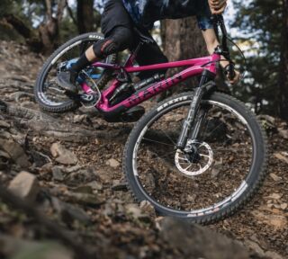 Marin Alpine Trail XR AXS being ridden on a New Zealand trail.