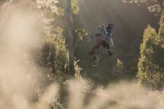 Marin rider Brady Stone, jumping on an Alpine Trail XR AXS.